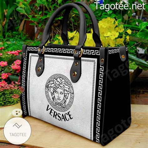 versace black clutch|Versace black and white purse.